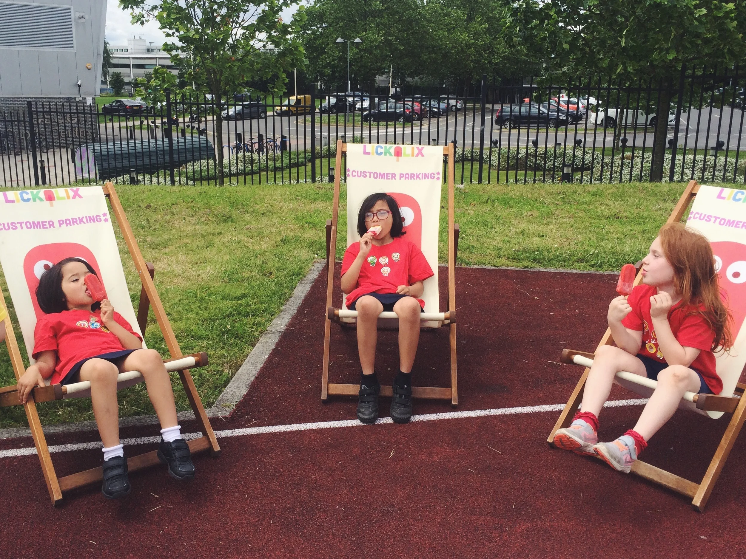 Some customers "parked" near Kenny and enjoying fruity ice lollies after a great run!