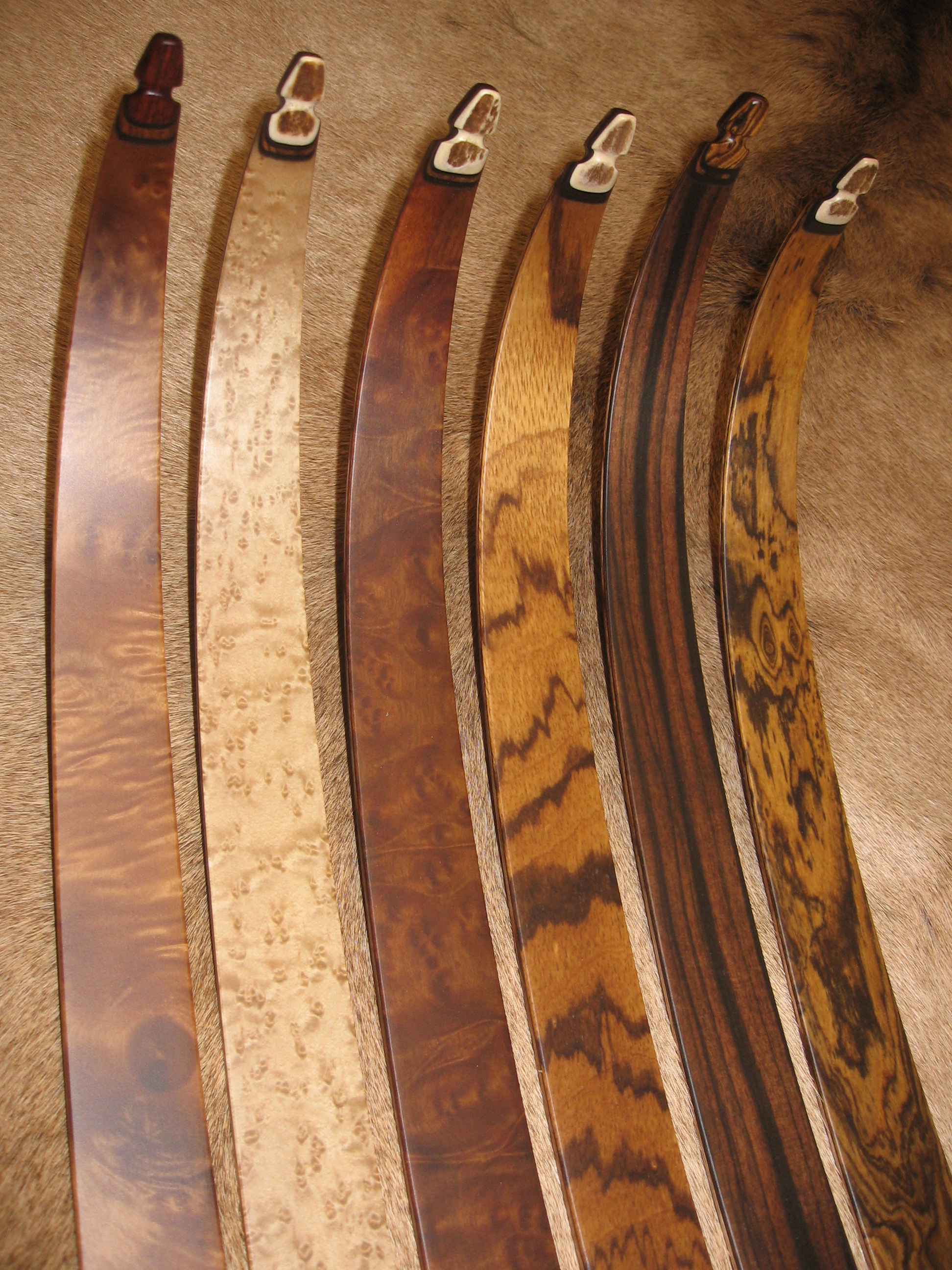 Anglestep Maple, Birdseye Maple, Camphor Burl, Zebrawood, Macassar Ebony, Bocote