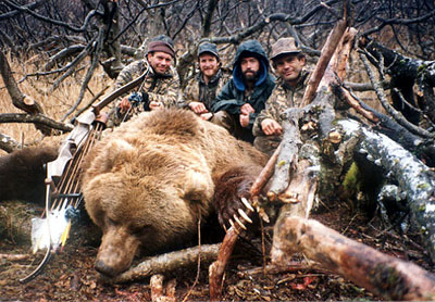 From left to right: Paul Schafer, Jeff Boothe, Brad Adams and Bart Schlayer. Kodiak bear taken by Bart Schlayer in the fall of 1992. One of Paul's last big hunts.