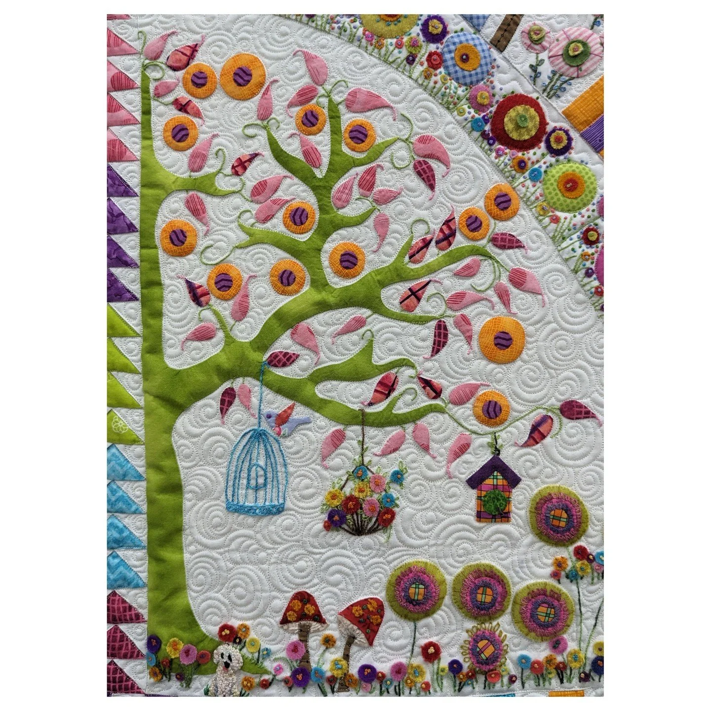 NOT MY WORK. This is a detail from a quilt I saw at the Great Wisconsin Quilt Show and unfortunately, I forgot to get the name of the artist. This is so fresh and well done! The colors are fun, the design is whimsical and the whole thing just made me