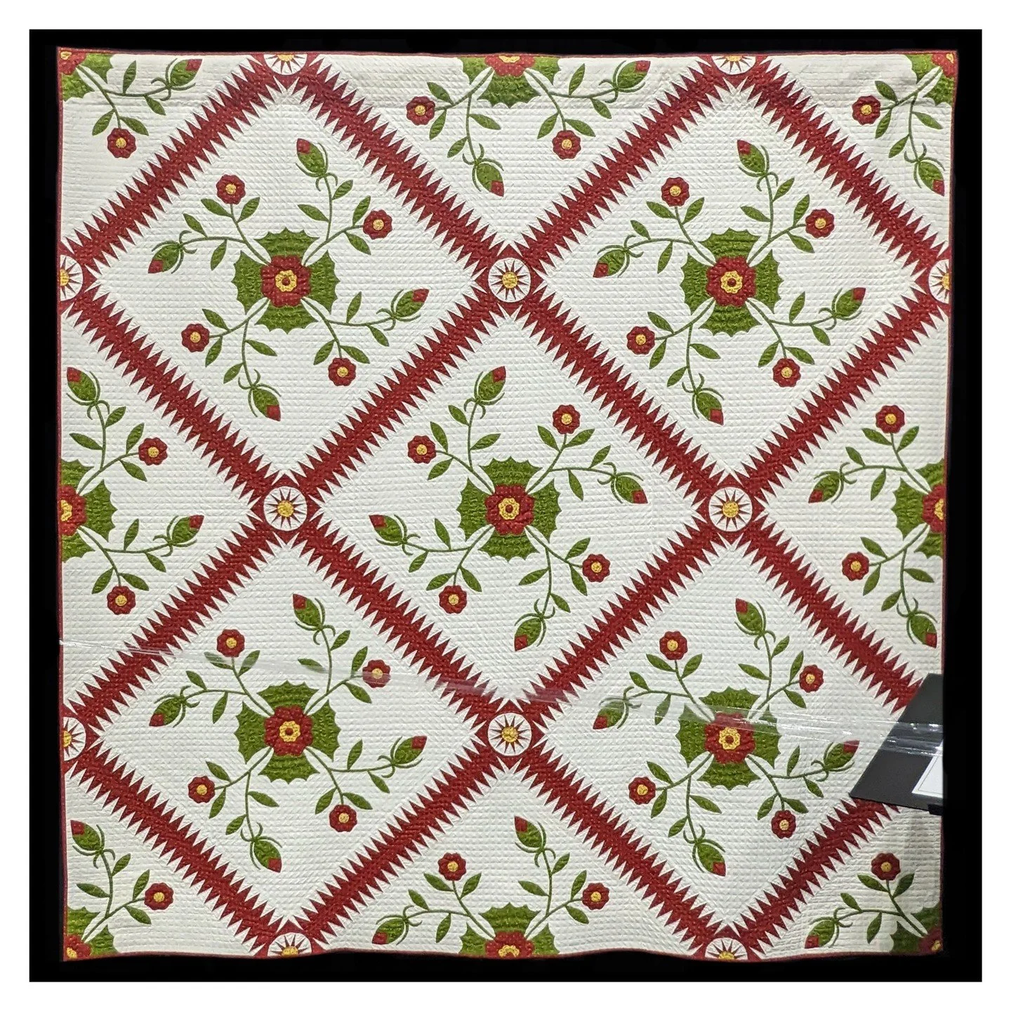 NOT MY WORK.  In the spirit of Christmas, I wanted to post a red and green quilt.  This is Whig Rose by Christine Dujardin. It is a beautiful example of a new quilt from an old pattern and very masterfully done. The pattern was popular during the mid