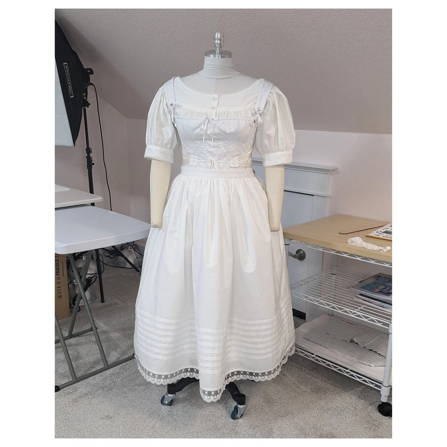In a departure from quilting, I've been making a n1830's Biedermeier costume. Progress so far consists of the chemise, the corset (NOT an entry-level garment sewing project), and two petticoats. The corded petticoat in the third picture has 350 feet 
