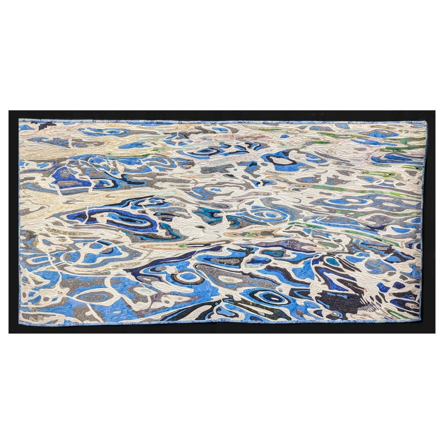 NOT MY WORK. This is Reflections in the Hirchhorn Fountain byElizabeth Iola Sylvan. I'm asked to make landscape quilts from time to time and water can definitely prove a challenge. I like the idea of tackling it head-on and making the quilt just abou