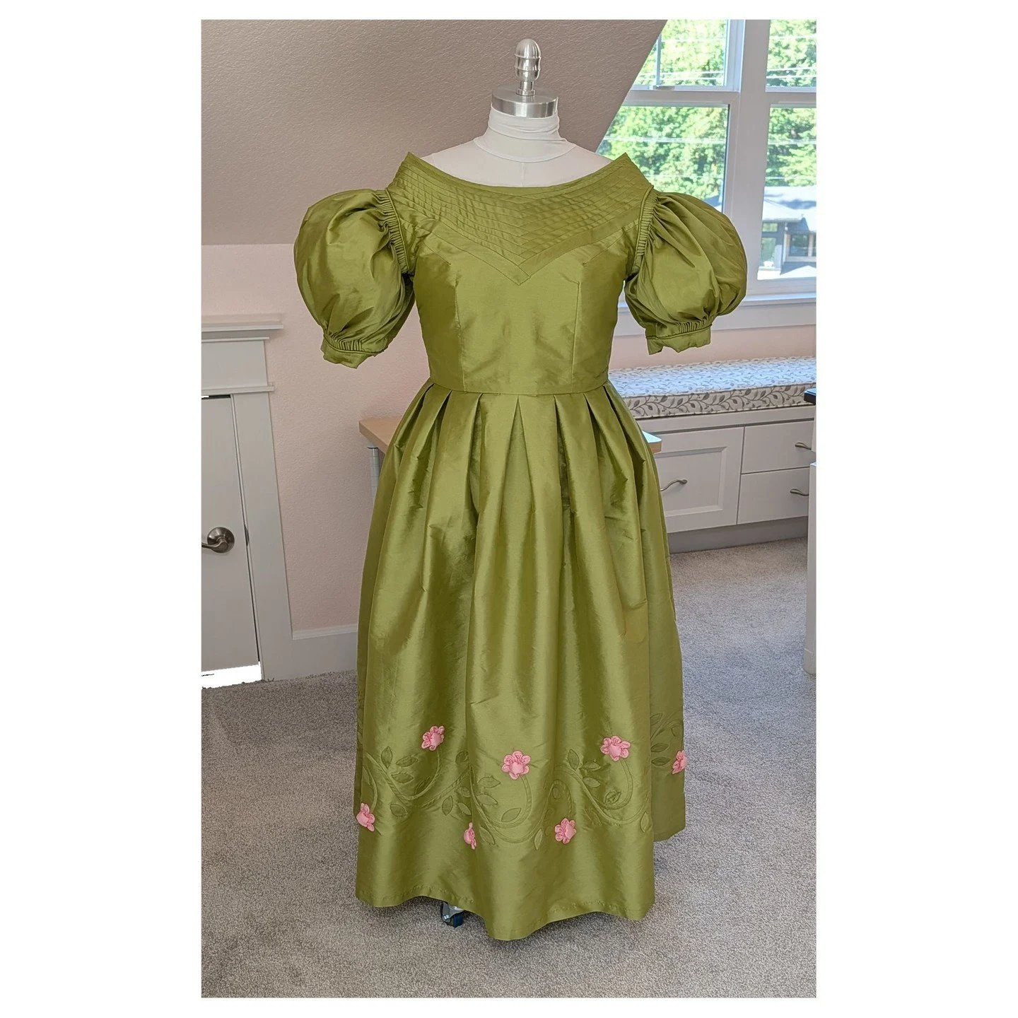 I finally finished my dress.... sort of. The dress fits the mannequin well, but me? Not so much. It needs to come in about an inch at the waist, but it's completely lined and finished on the inside, and the amount of work it's going to take to rip it