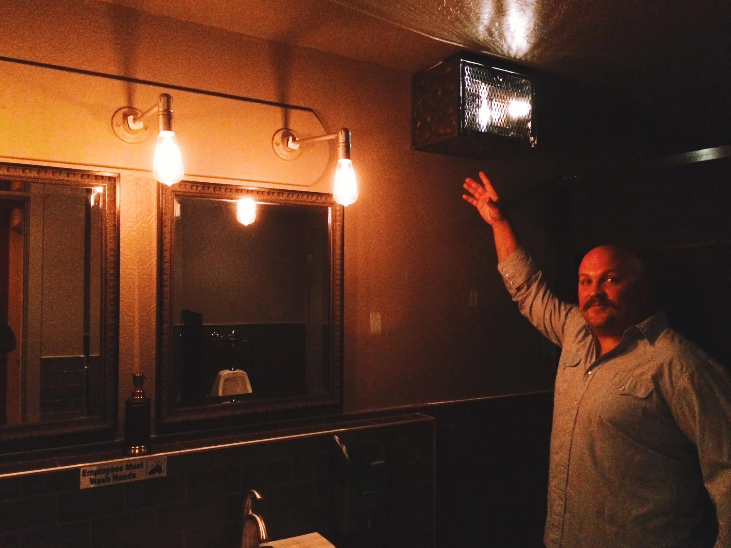 Bathrooms house vintage radio's that play old time shows like The Lone Ranger, curated by Johnny Peppinger.