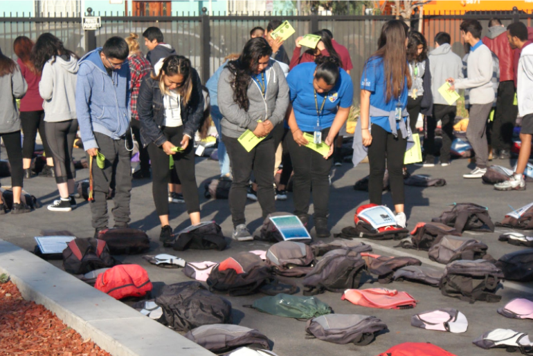 Some of Alliance Neuwirth Leadership Academy’s 600 students viewing the MSMF-sponsored “Send Silence Packing” teen suicide prevention exhibit from Active Minds.