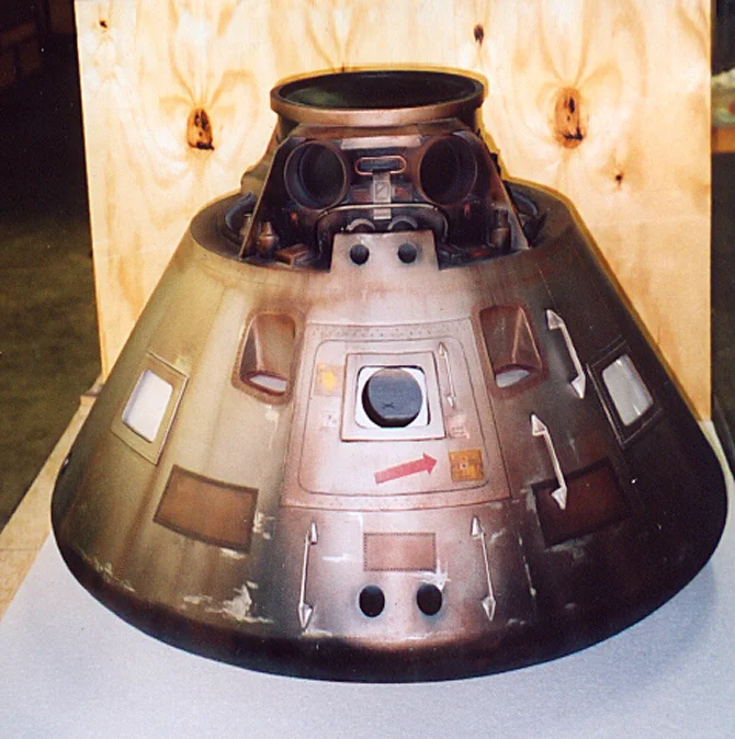 This miniature space capsule was placed on a dry "sea floor" set fogged-up and surrounded in black to allow us to shoot his approach to it.