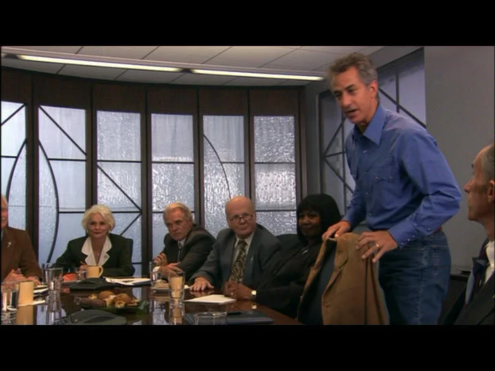 Preacher's (David Strathairn) conference room.