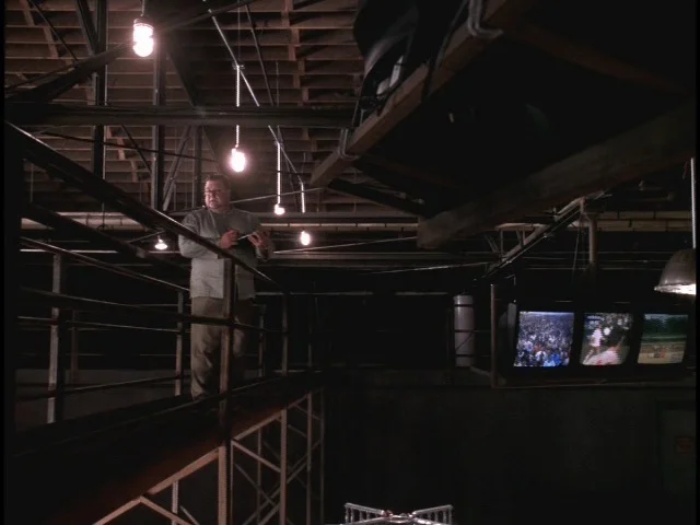 Deepthroat (John Goodman) at the command center in his lair.