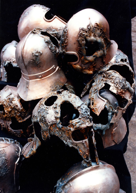 A pile of rotting helmets.