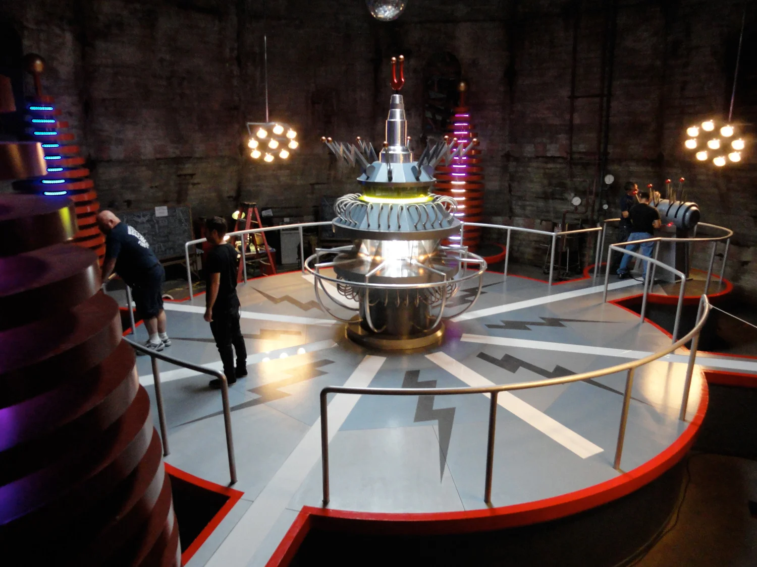 Part of the plot of the movie within the movie in Teen Beach Movie revolves around an eccentric developer (Steve Valentine) and a mad-scientist (Kevin Camberlin) who are conspiring to destroy the beach and Big Momma's. I built this abondoned lighthouse set to house their dastardly weather machine, seen here ready to send it's evil ray out to eleimate the waves. VFX extended the lighthouse to it's full, interior height, as our studio space was just 25 feet tall.