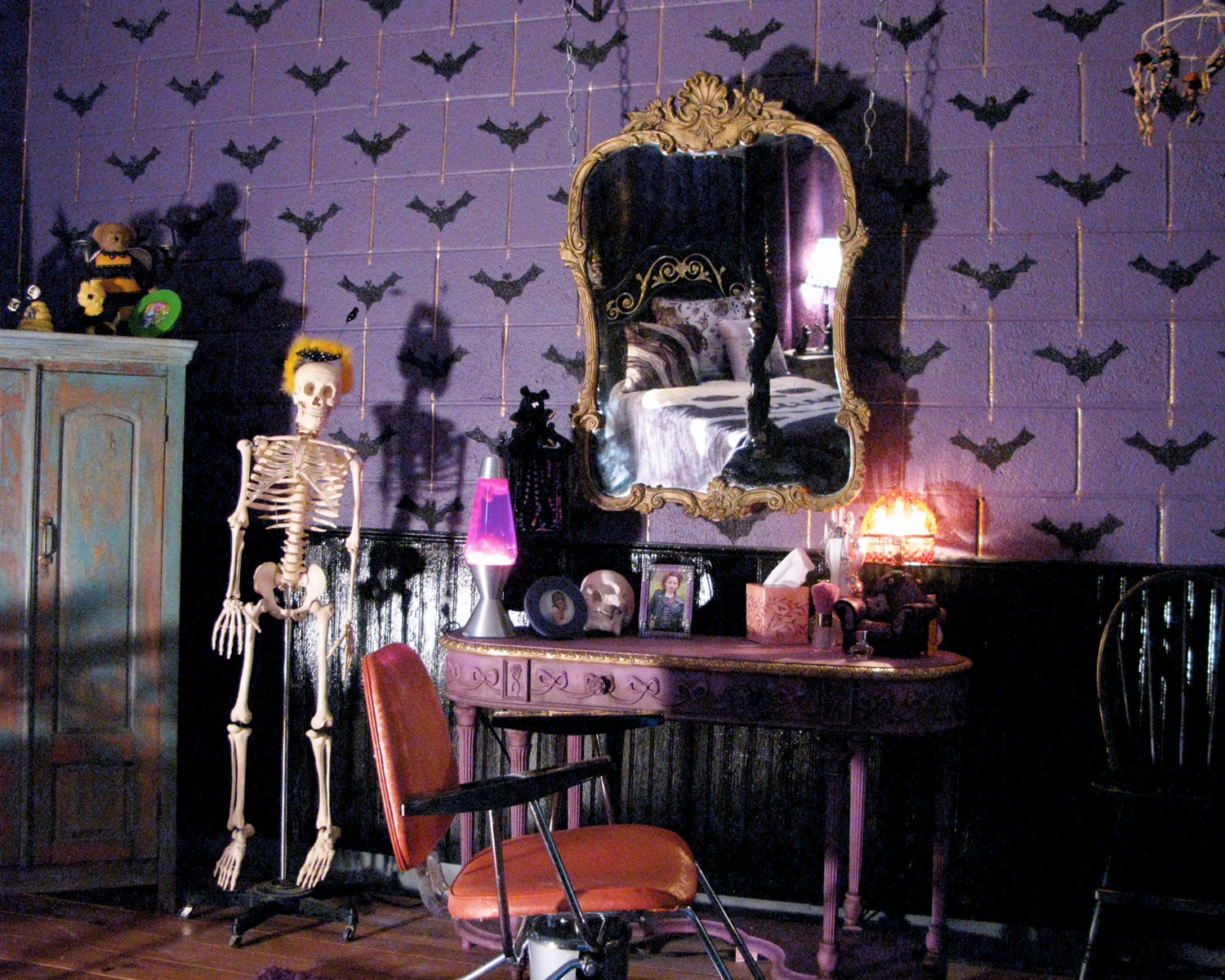 Reverse of Goth Bumble bee scout's (Kelly Gould) bedroom ( she's really into Halloween, costumes and makeup)