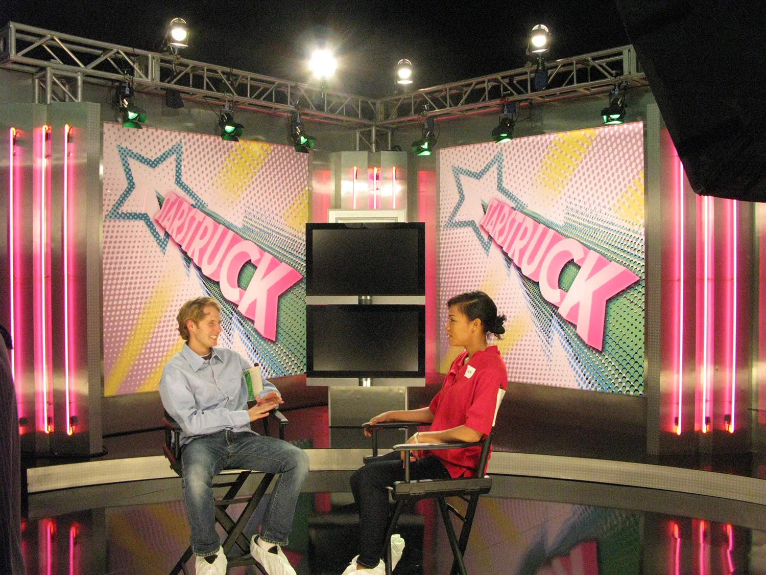 "Starstruck" TMZ-style gossip show stage set.