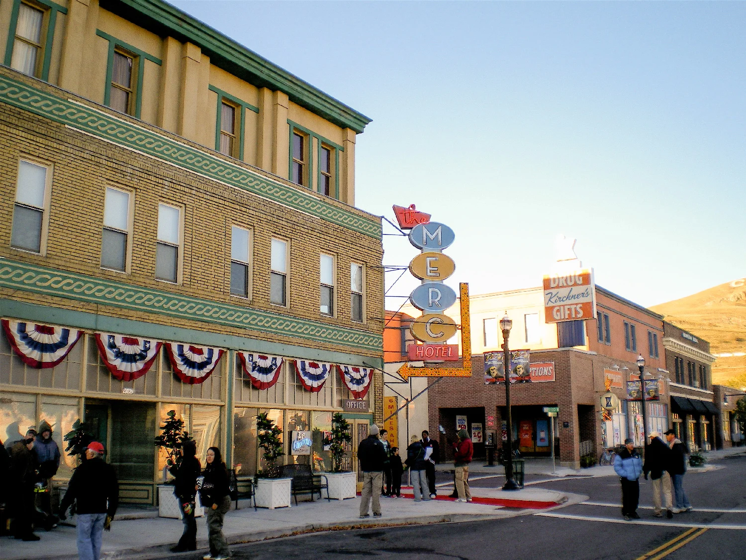Main street of a route-66-style fictional town "Mercury". Here we added a third story, huge neon signage and facade details to the foreground "Merc" hotel, and a second story and signage to the background drugstore in this shot.