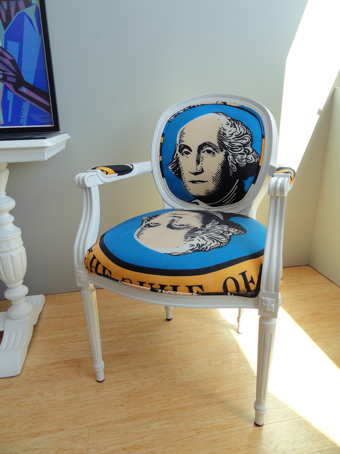 George Washington chairs, made from flea-market granny chairs reupholstered with $2 a yard Washington State nylon flags from a blemished roll.