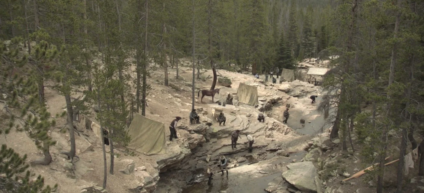 I art directed the mini series Gold Fever for production designer Ernesto Solo. It centered around the agony and the ecstasy of the California Gold Rush of 1849. This is a shot of the grim camp along the American River.
