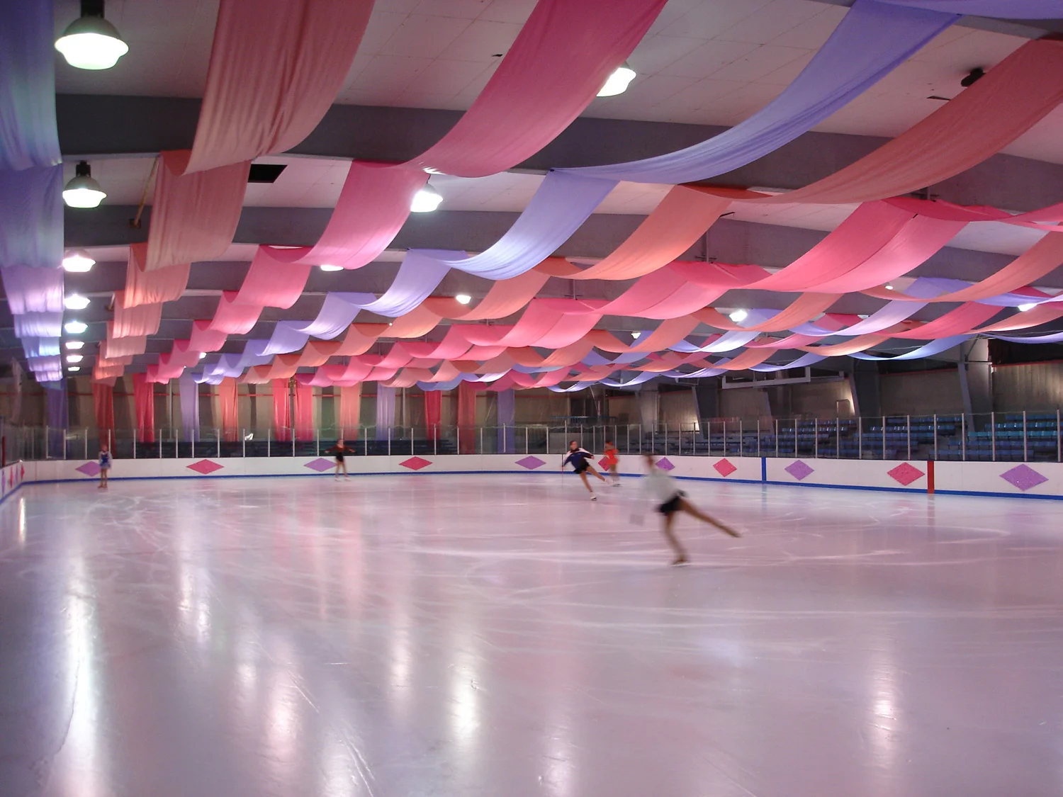 Go figure is the story of a young figure skater that ends up on the hockey team. So a lot of time was spent in various ice rinks. Here is one such arena, a really sad municipal ice rink made fabulous with the addition of some color. 