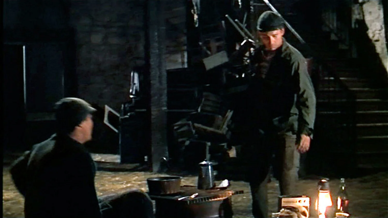 Unsuspecting Serbian thugs in their deserted building encampment.