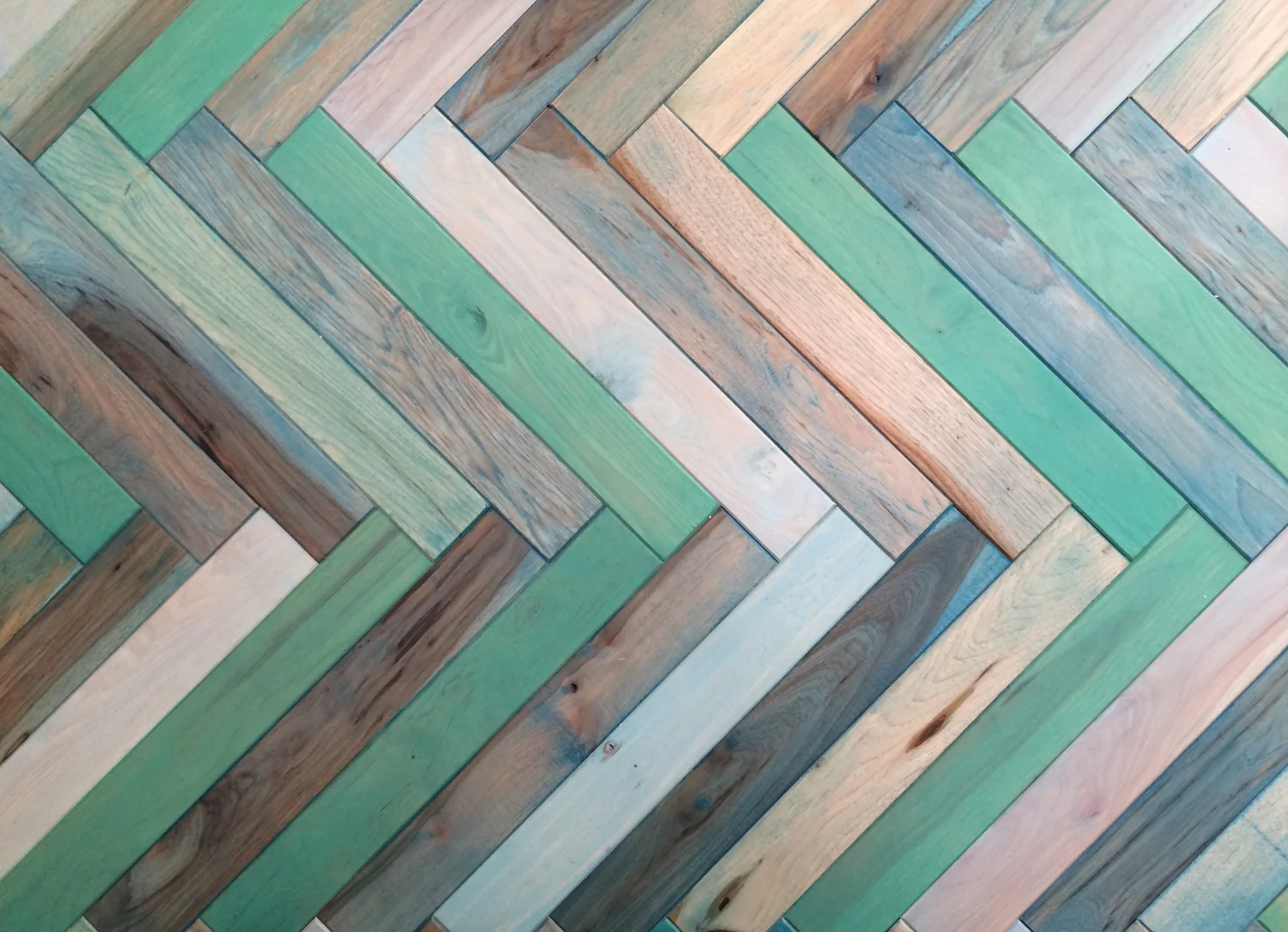 The client brought us an image of a daring museum space in Germany that featured an acid green rubber floor. I offered a more regionally appropriate, western vernacular idea of a herringbone turquoise floor. They loved the idea, and went for it on the spot.