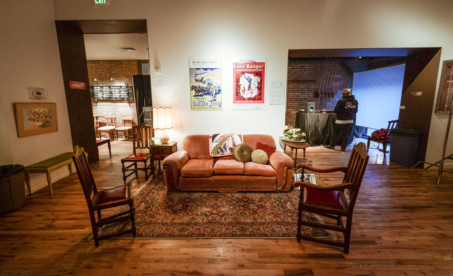 The "Living Room" spilled outside the "set" we created, and occupied more of the Park City Museum's gallery space. Les Booth perfectly decorated it in the same theme. And we found loads of historic posters from some of the Beehive State's long forgotten film projects to adorn the walls.