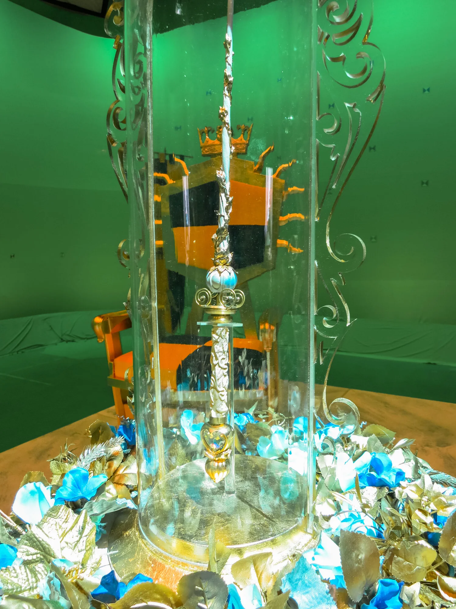 Fairy Godmother's all-powerful wand awaits the ceremony under it's enchanted glass bell.