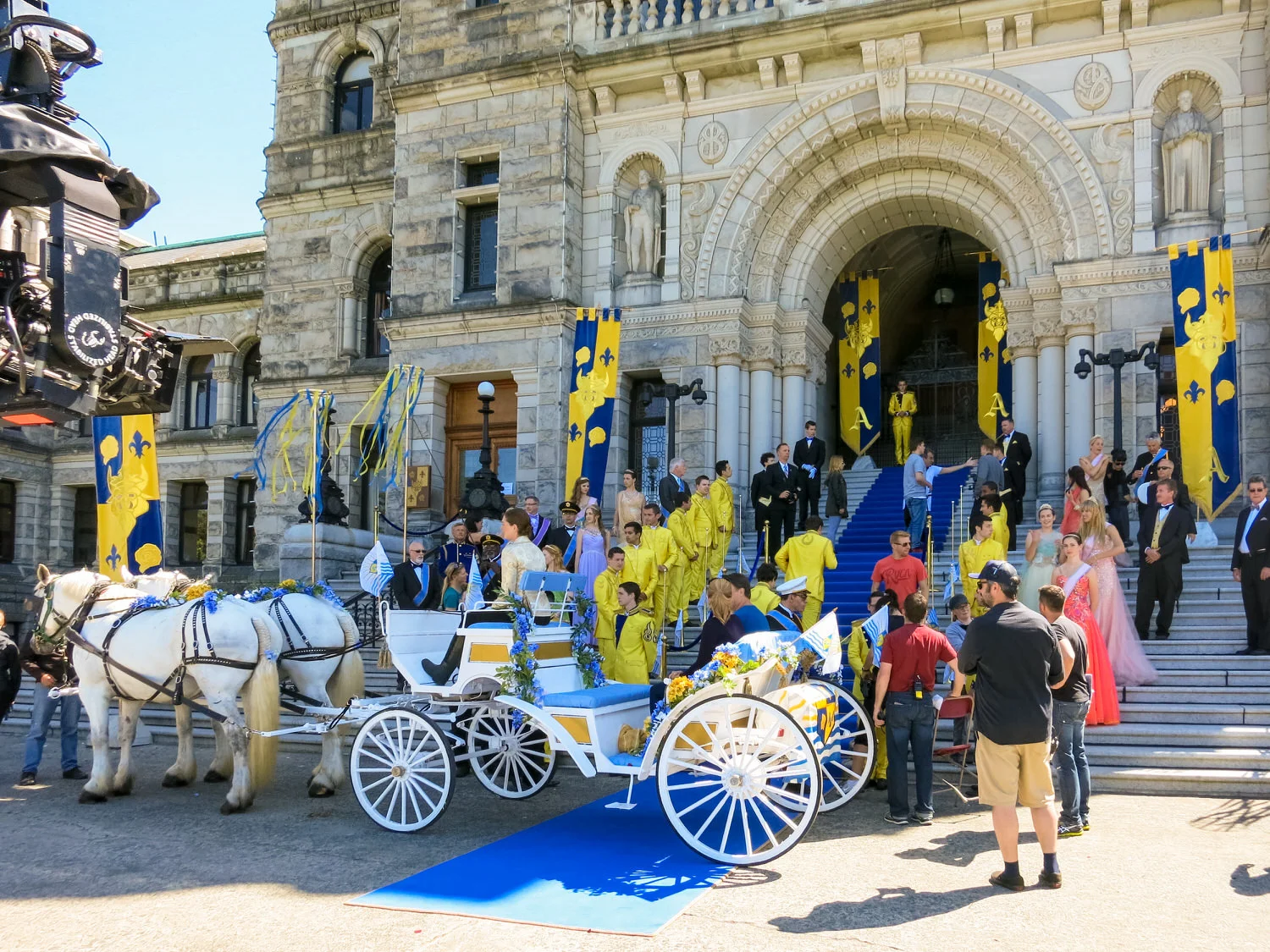 The royal carriage arrives for the coronation. The royal palette of Auradon comes from Belle and the Beast's costumes from the dance scene in Beauty and the Beast.