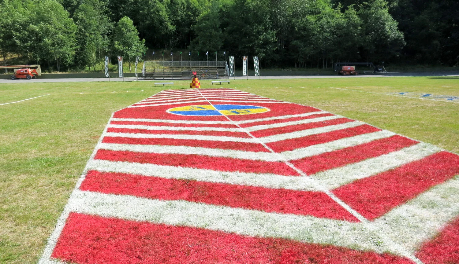 Since the center of any playing field is often where play slows down, we created the "kill zone" to make the center field much more active. The zone is guarded by two "Dragoniers", one from each team. The Dragoniers evoke the idea of dragon-fire that the previous generation faced. Red and yellow, high-velocity bean bags fire from the "dragon's" mouth, a direct hit is a game ending event for a player. 