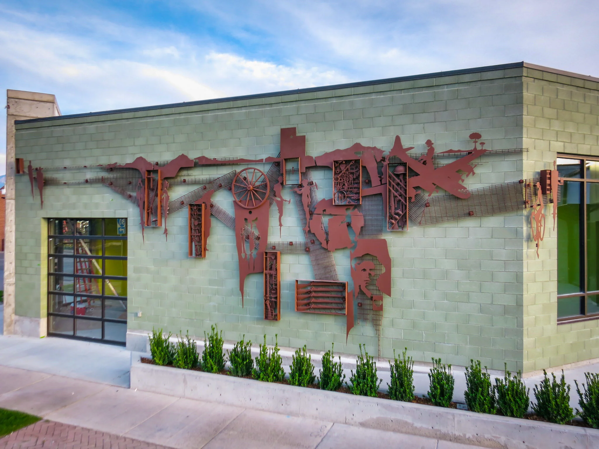 Atlas Architects approached me and my company CSB about creating a large art piece for the side of their new commercial development in Salt Lake City. All of us being big Lefties, after several discussions we hit on the theme of 10,000 years of labor in Utah. With my friend and collaborator Christian England I set out to develop a timeline and a narrative.