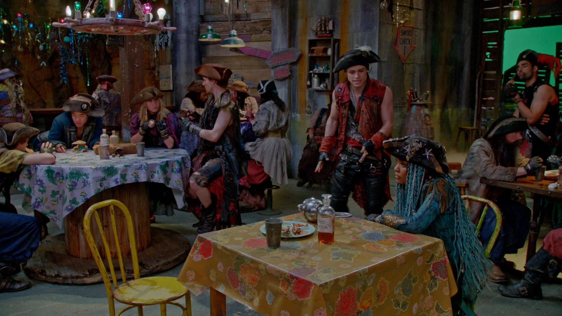 Harry Hook (Thomas Doherty) conspires with Uma (China Anne McClain) in Ursula's Fish and Chips Shoppe.