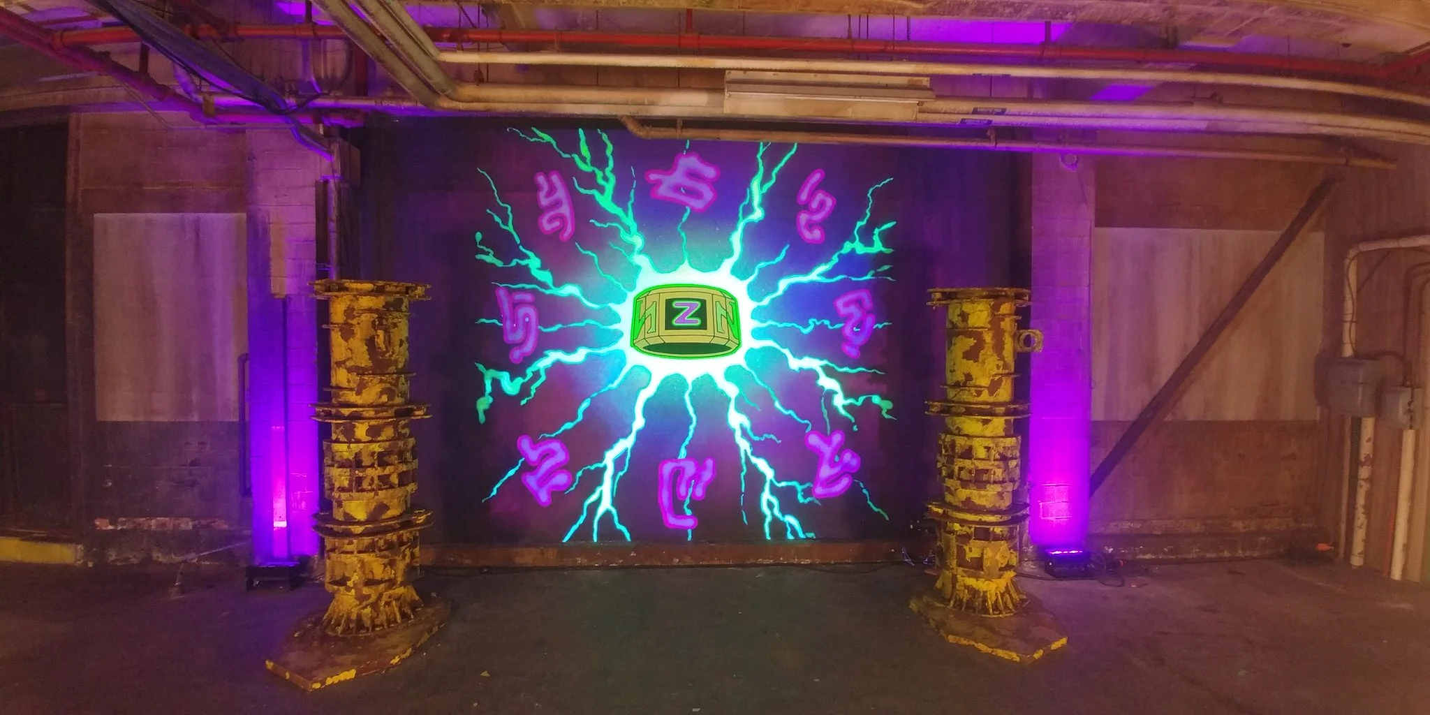 The Z-Band mural glowing in black light. 