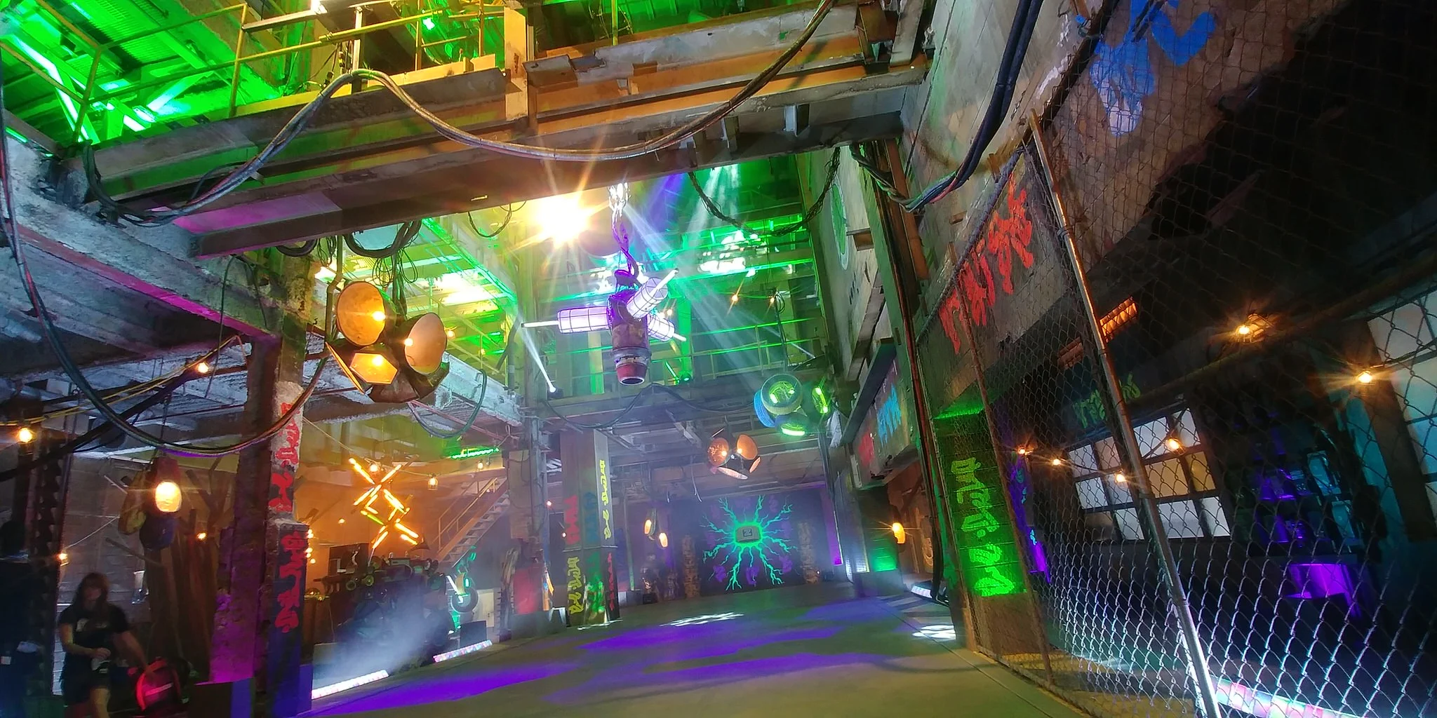 The tentpole musical number of Disney's Z-O-M-B-I-E-S is BAMM set in the very heart of the ruined energy plant. Here the zombies can truly be themselves safe from human interference. Also here they bring to bear all their ingenuity and technical skill to create a cobbled-together rave-like atmosphere. 