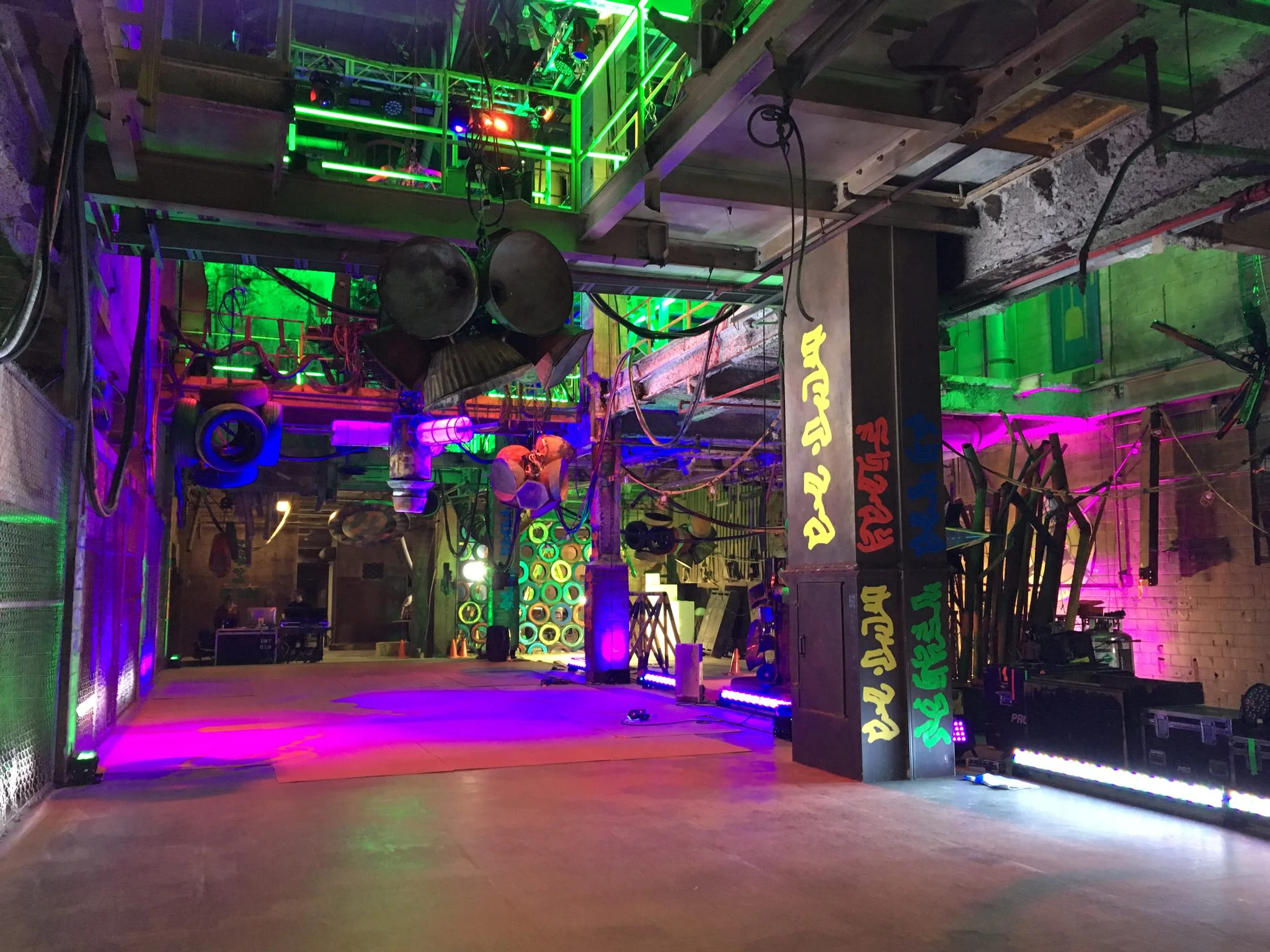 Another view of the main hall of the ruined energy plant. Invisibly embedded in the center of the "concrete" floor is a "tricking" air mattress system that allowed the zombies to perform choreography that seemed to defy physics.