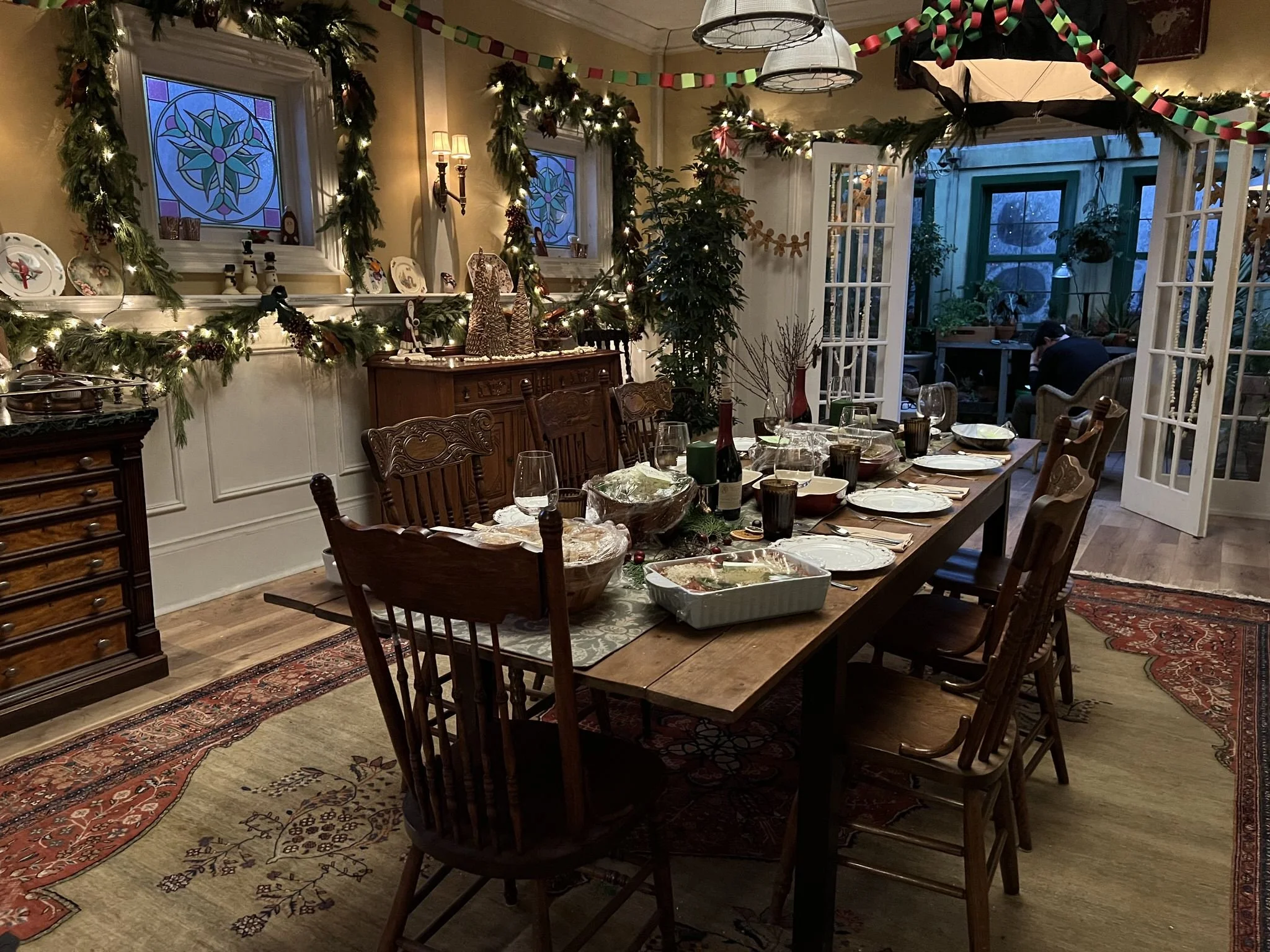  The dining room in Kate’s interior, looking into her greenhouse beyond. 