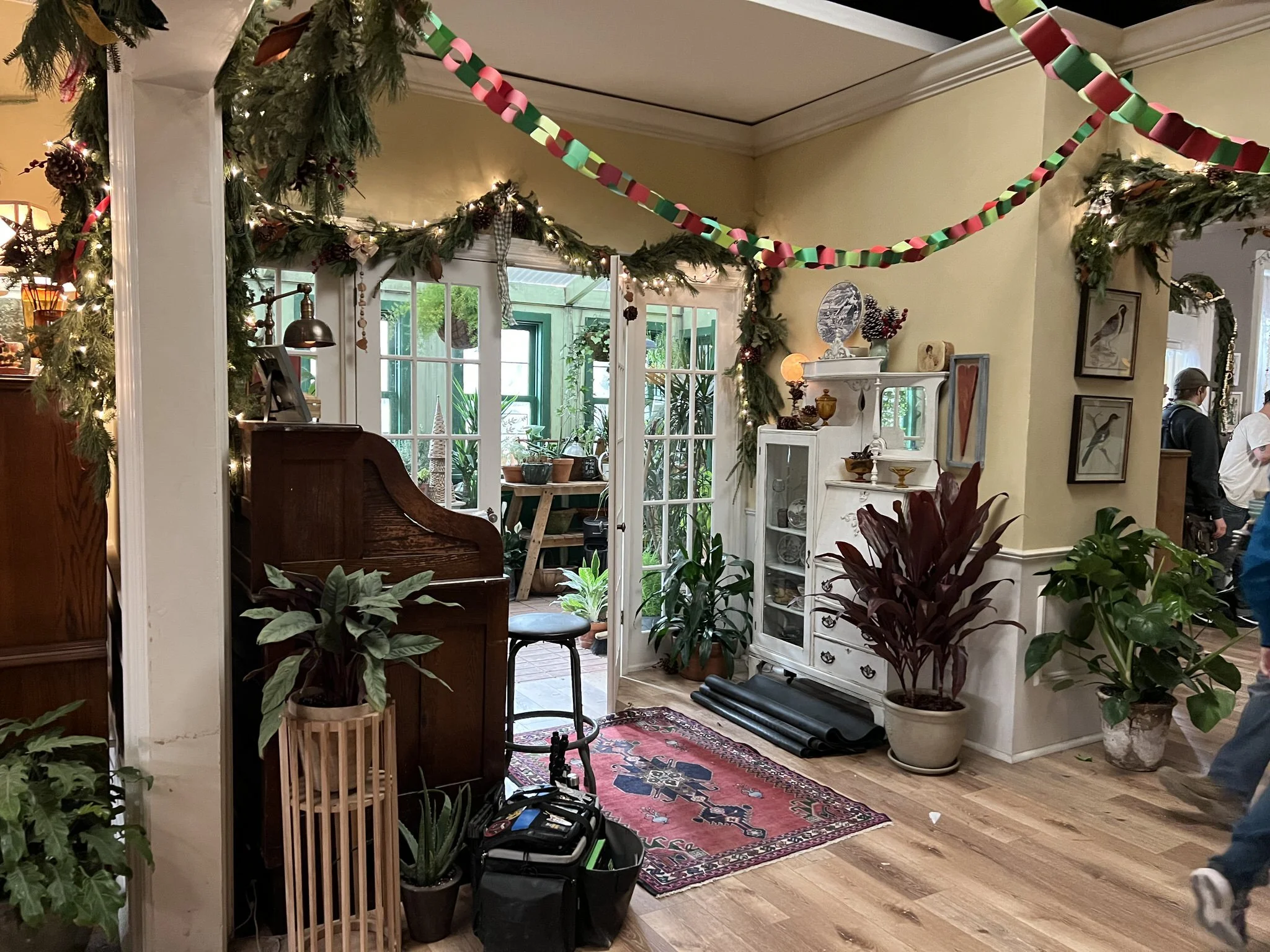 The whole back of the house is spanned by a greenhouse Kate built by enclosing an old covered porch. Kate is both an architect and a dedicated environmentalist. I wanted her to have a functional winter garden in keeping with her earthy ethos. I also