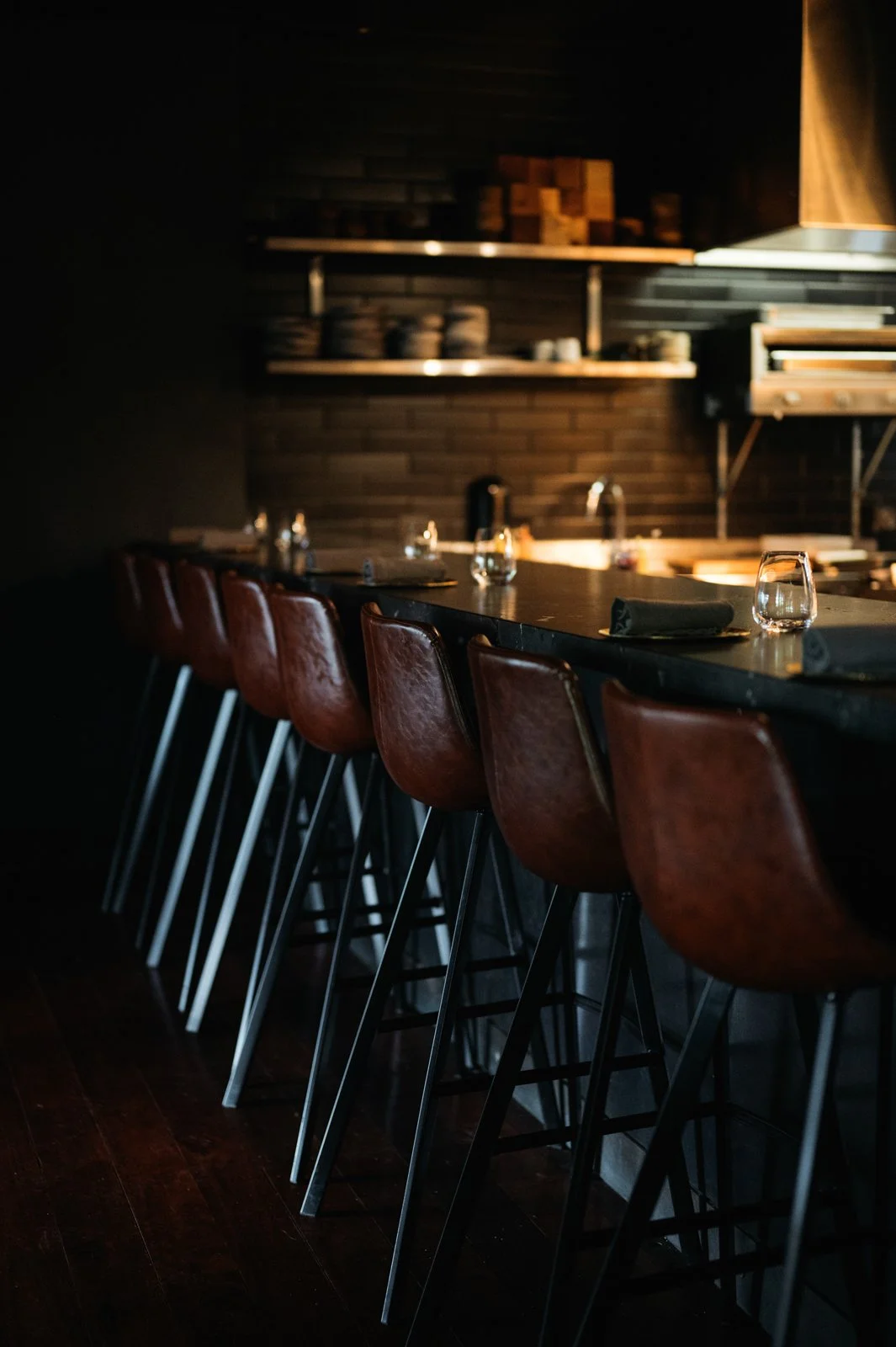 Bar seating looking into the kitchen