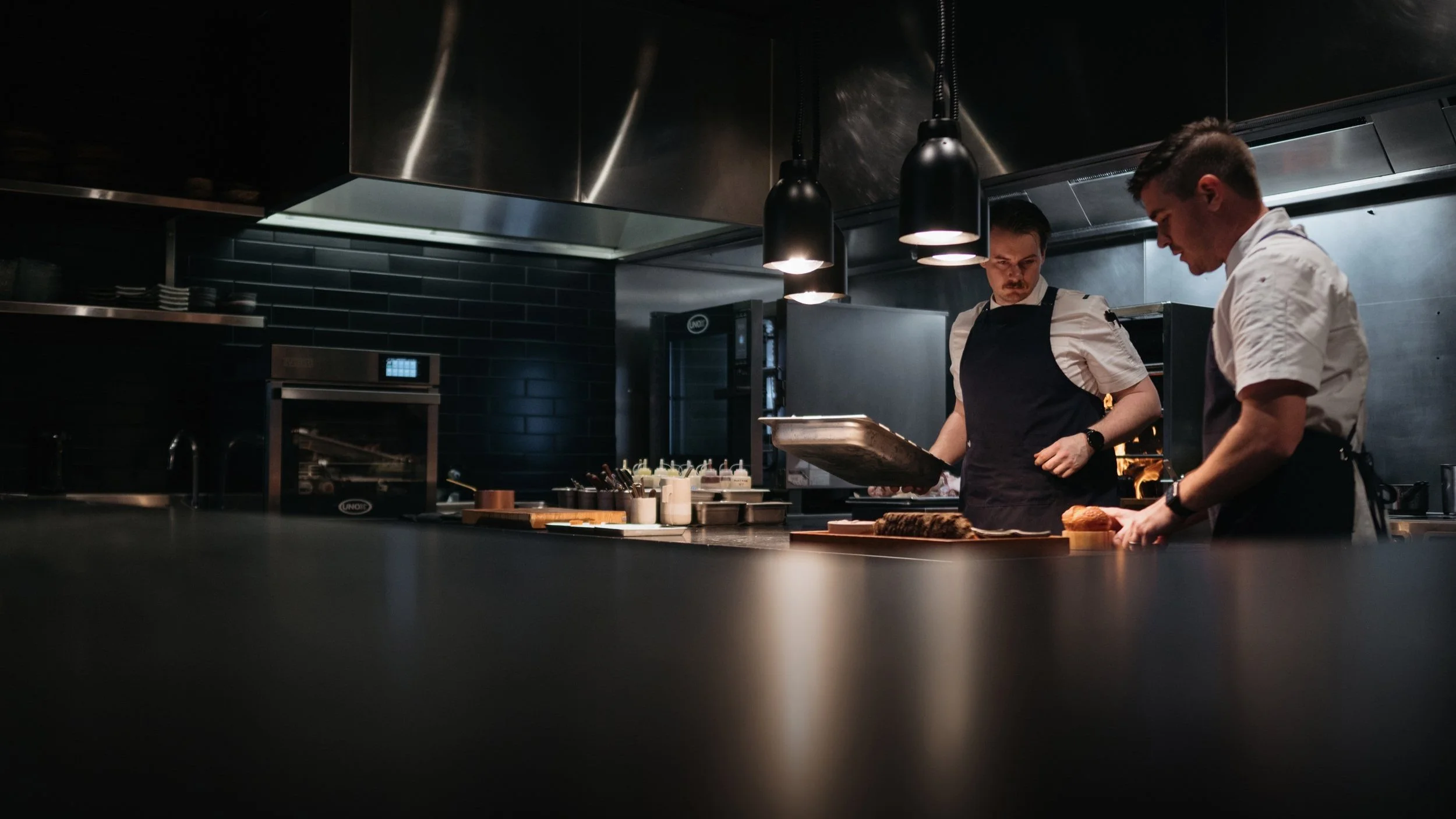 Chef at the pass at EXP. Restaurant, two-hat fine dining in Pokolbin, Hunter Valley