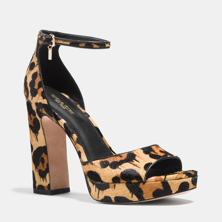  These are the block-heel platforms that Regina George's mom wore when she claimed she was NOT a regular mom. I promise. This print isn't regular leopard, it is COOL leopard.  Coach platforms, $265, at  Coach .  