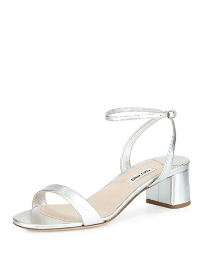  Dainty silver shoes that remind me of Daisy Buchanan in the Great Gatsby. Because let's be honest, Daisy would ONLY wear Miu Miu while ruining people's lives.  Miu Miu metallic block heel sandal, $495, at  Neiman Marcus .&nbsp;  