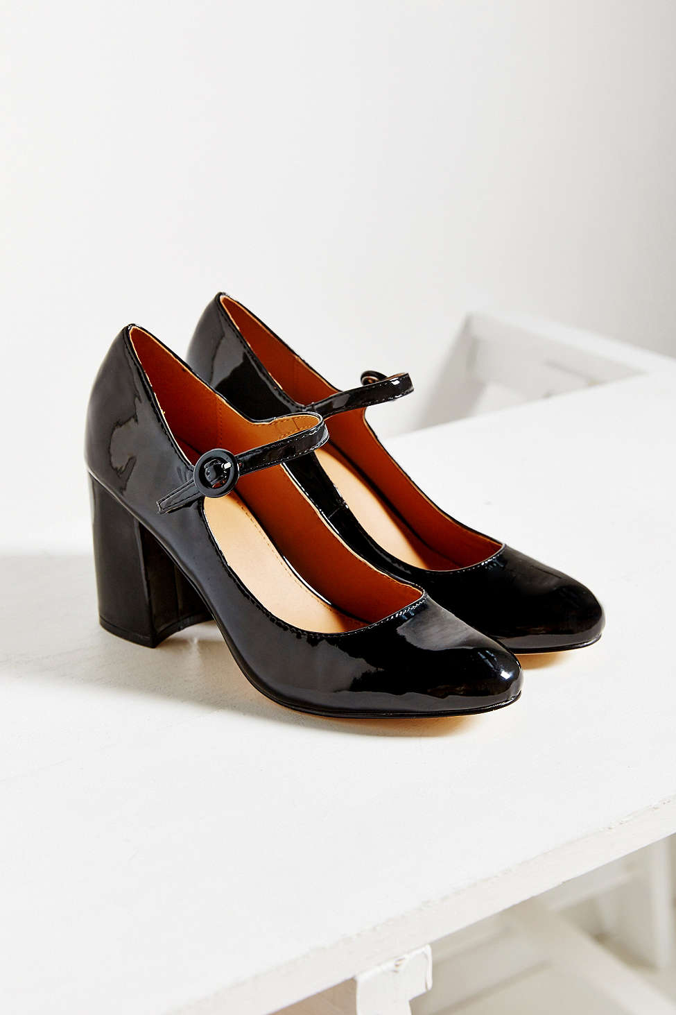  There's a coquettish charm to these patent vegan leather Mary Janes.  Maude patent heel, $59, at  Urban Outfitters .&nbsp;  