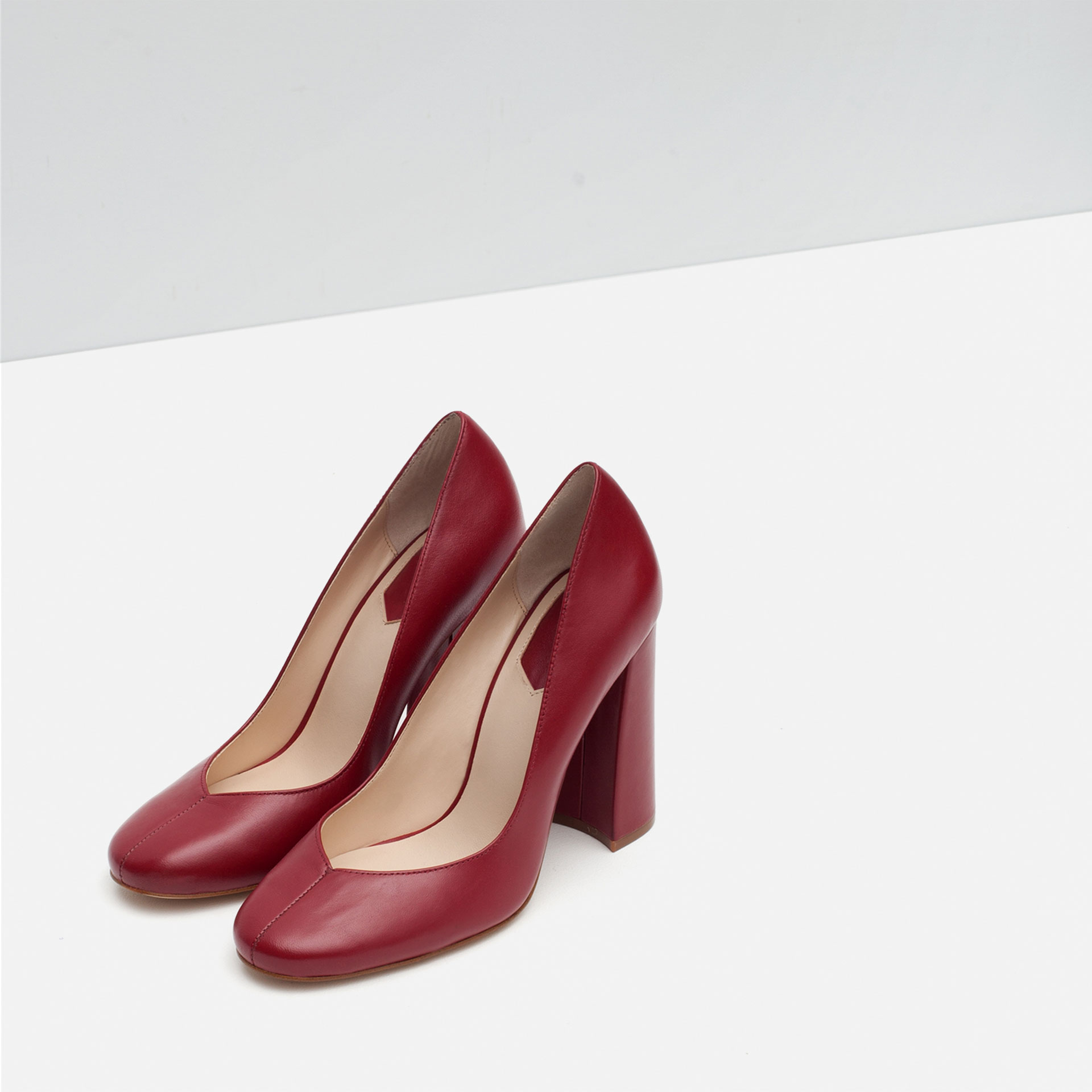  A rich shade of oxblood pairs pretty with the foliage still sprinkled across the city streets.  Zara block heel leather heels, $89.90, at  Zara.&nbsp;   