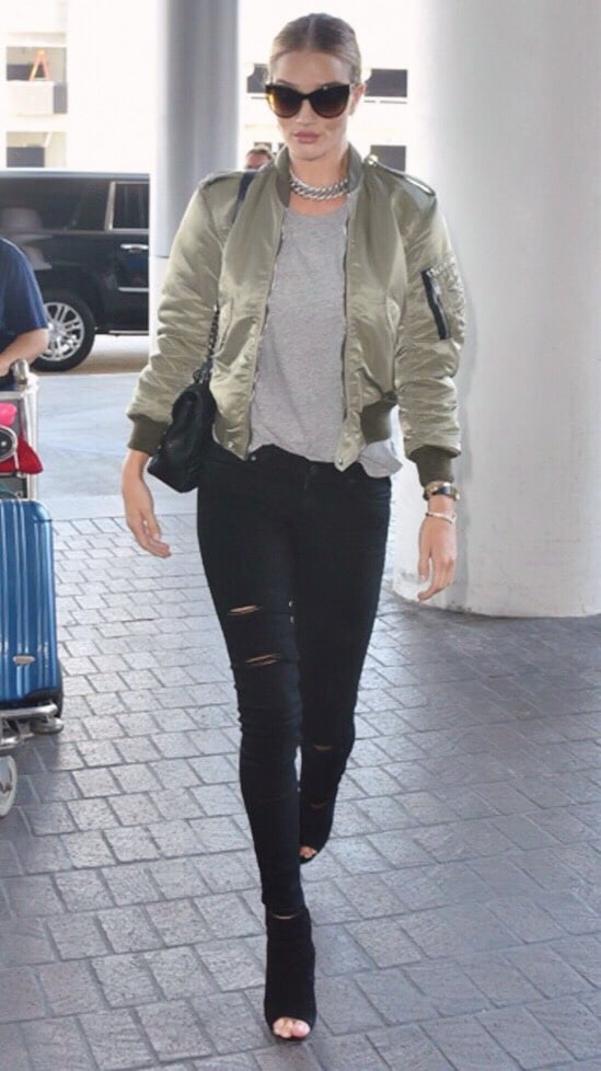  Going to the airport never looked  so  cool. Rosie in a Saint Laurent number! / Via  Flywheel  
