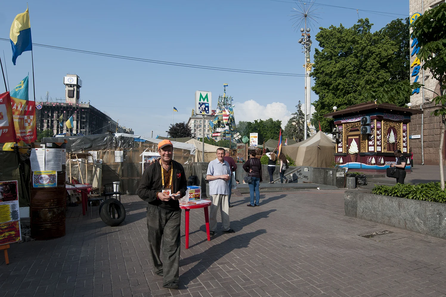 A man distributing flyer on Maidan square