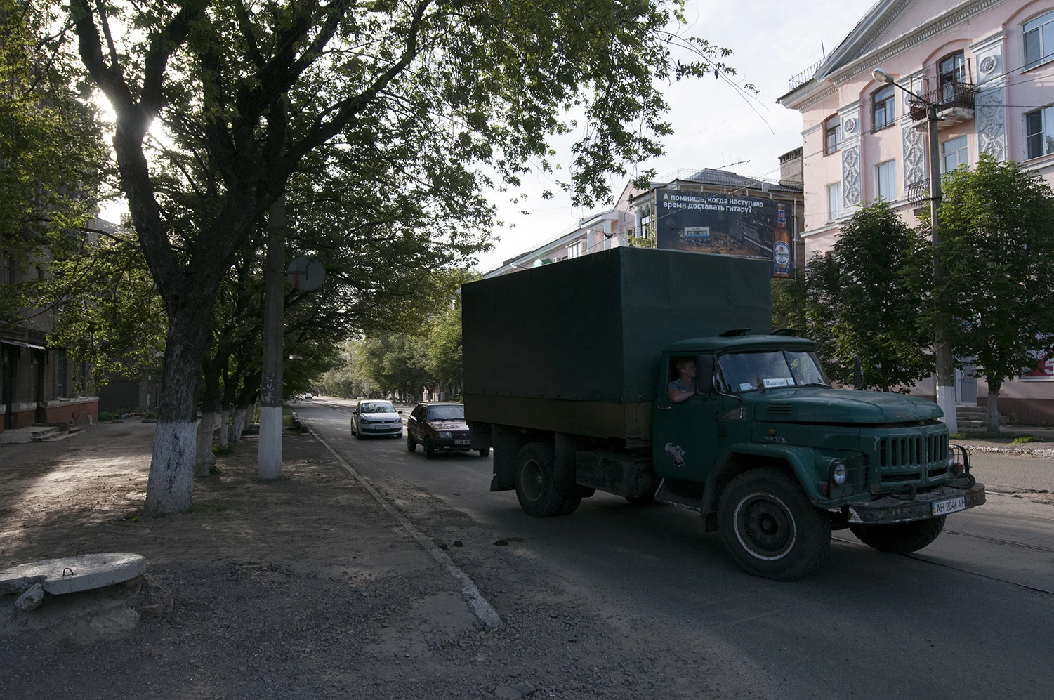 A camouflage truck driving through Horlivka