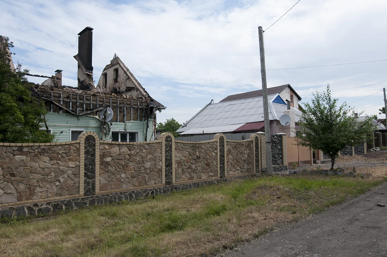 Bombed house located between the Sergey Prokofiev Airport and the Train Station 