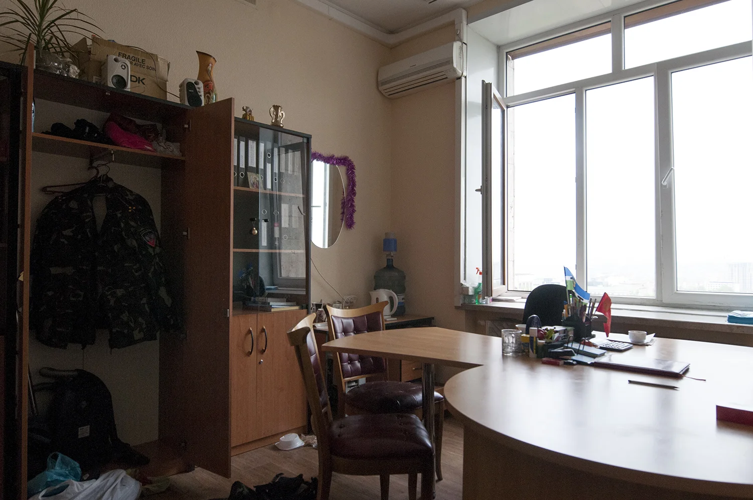 Uniform of a officer of the Donetsk People's Republic hanging in a closet, ODA