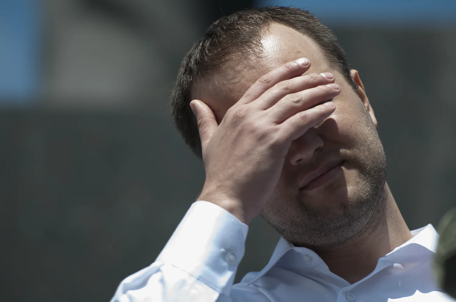 Pavel Gubarev, Governor of the Donetsk People’s Republic , protecting his eyes from the bright sunlight