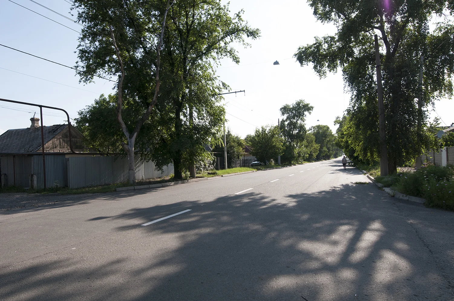Man walking down the desert Stratonavtiv Street 