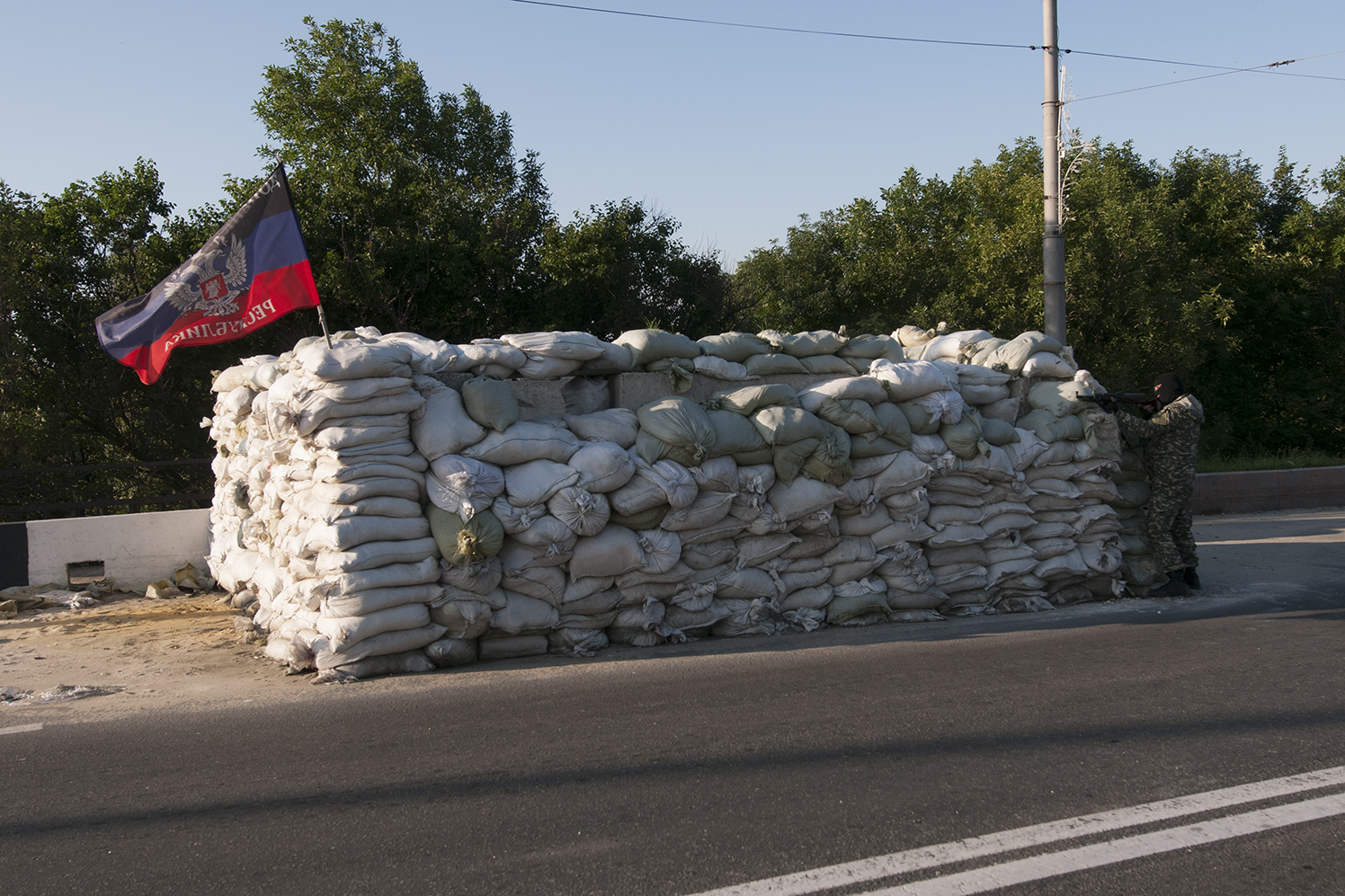 Solider from the DPR just after he took a shot in direction of the airport