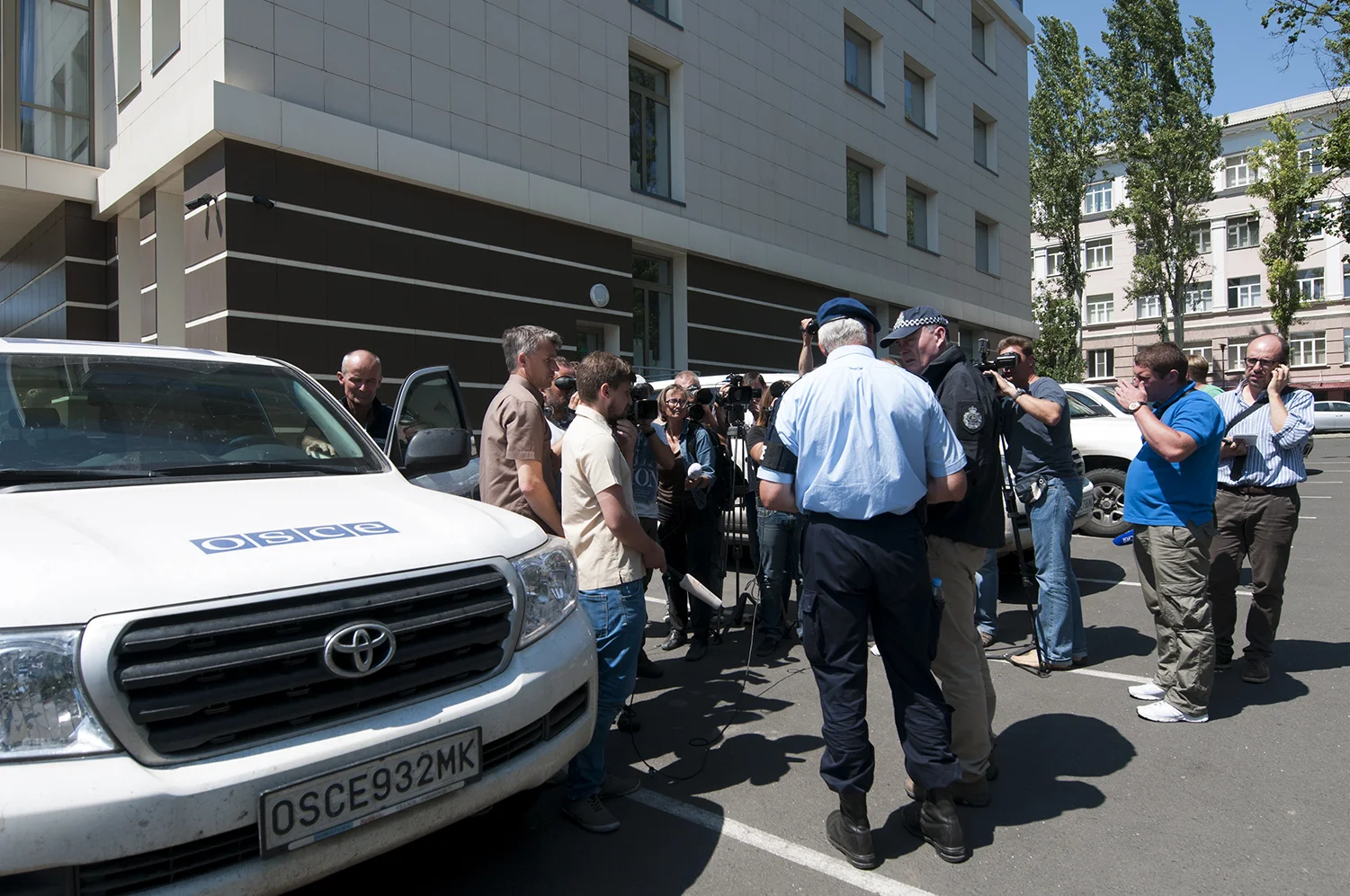 The OSCE, Deutsche and Australian police giving a statement to the press after they took the decision on canceling their journey to the crash site - 27th July 