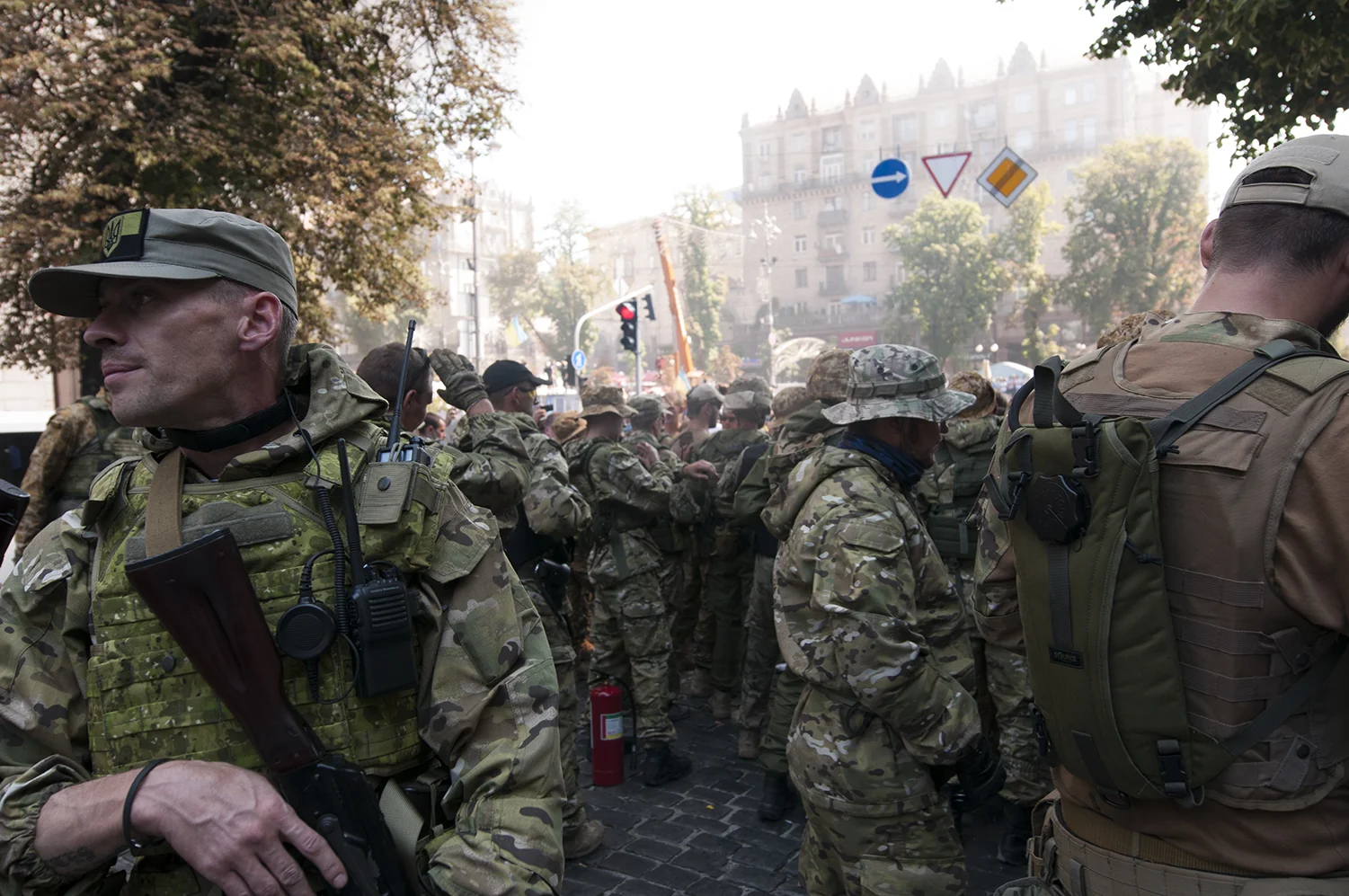 Soldiers from the National Guard being pushed back from Maidan